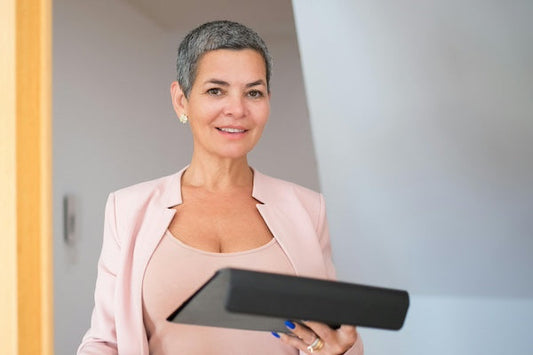 Attractive female director with laptop
