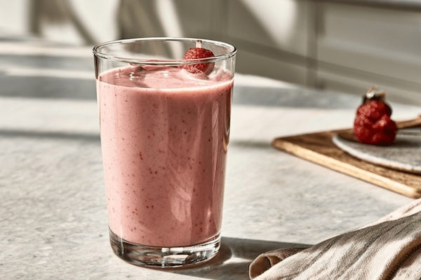 Strawberry meal replacement shake on a kitchen counter