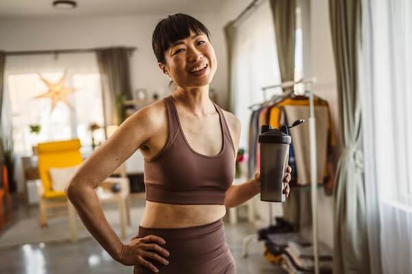 Woman over 40 drinking a meal replacement shake