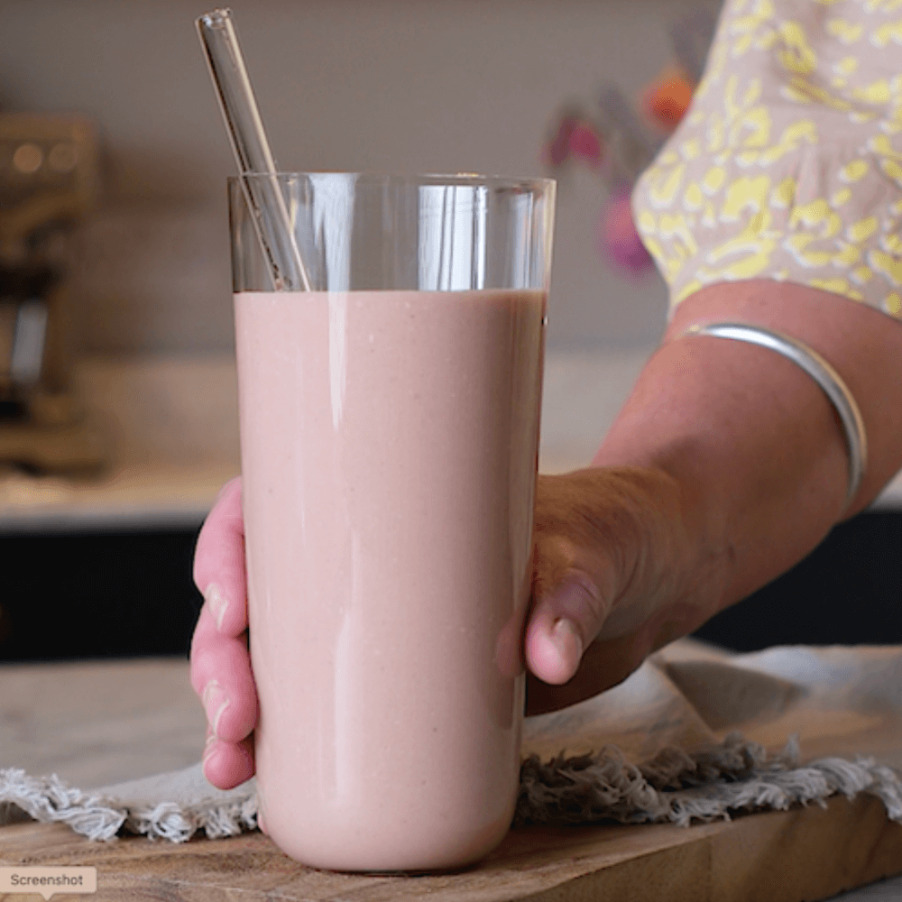 Eve Biology shake, strawberry flavour  in a glass