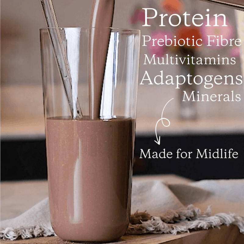 Chocolate shake in a glass with text about health benefits on a blurred background