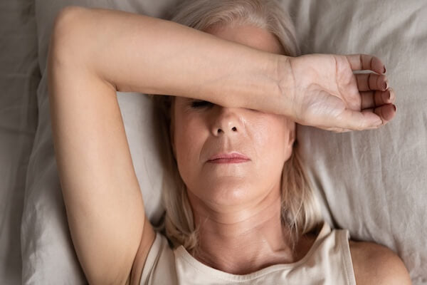 woman in menopause unable to sleep