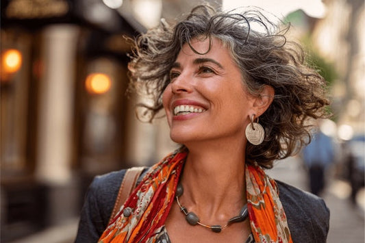 Woman in early fifties walking in city