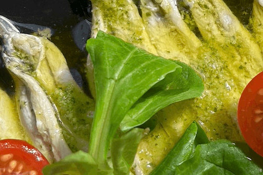 Anchovies with basil pesto and olive oil