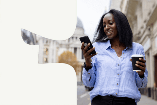 Business woman in street with coffee