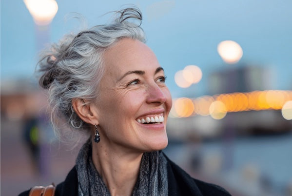 Woman walking, grey hair, happy