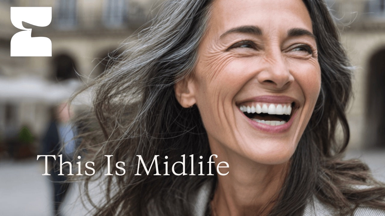 Woman laughing with text 'This Is Midlife' in an outdoor setting