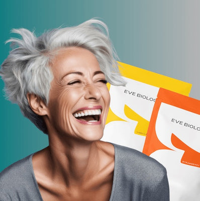 A smiling older woman with short silver-gray hair is shown in profile against a teal gradient background, with two Eve Biology product packets partially visible behind her.