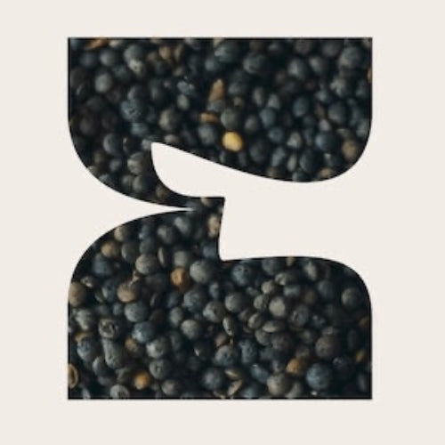 Lentils in a geometric shape on a beige background