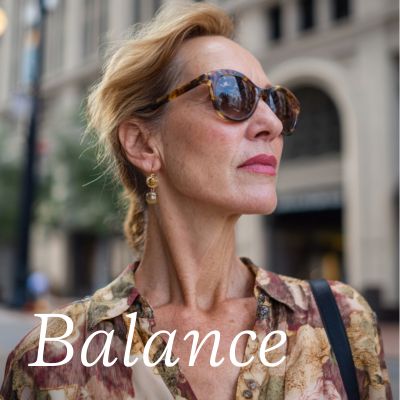 woman in sunglass and patterned shirt