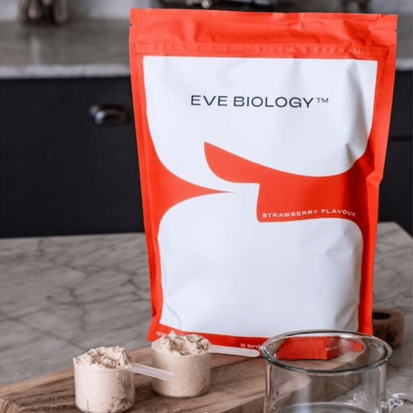 Eve Biology red pouch with two scoops of powder