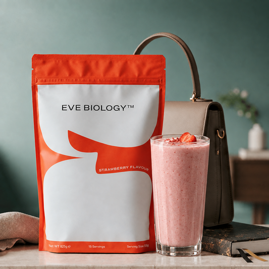 Strawberry shake with pour of powder and woman's handbag